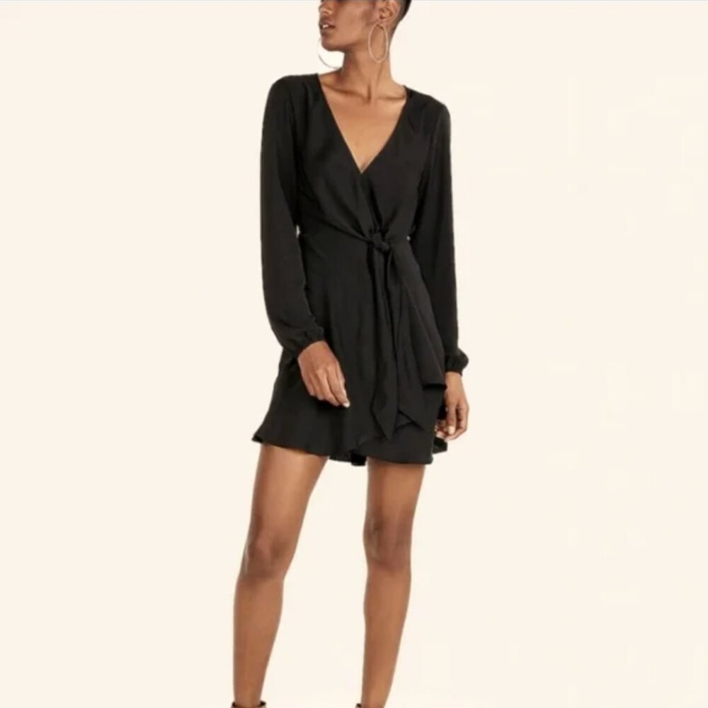 Sleek black long sleeve mini dress